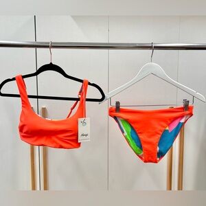 Medium Maaji women’s reversible bikini top and bottom.